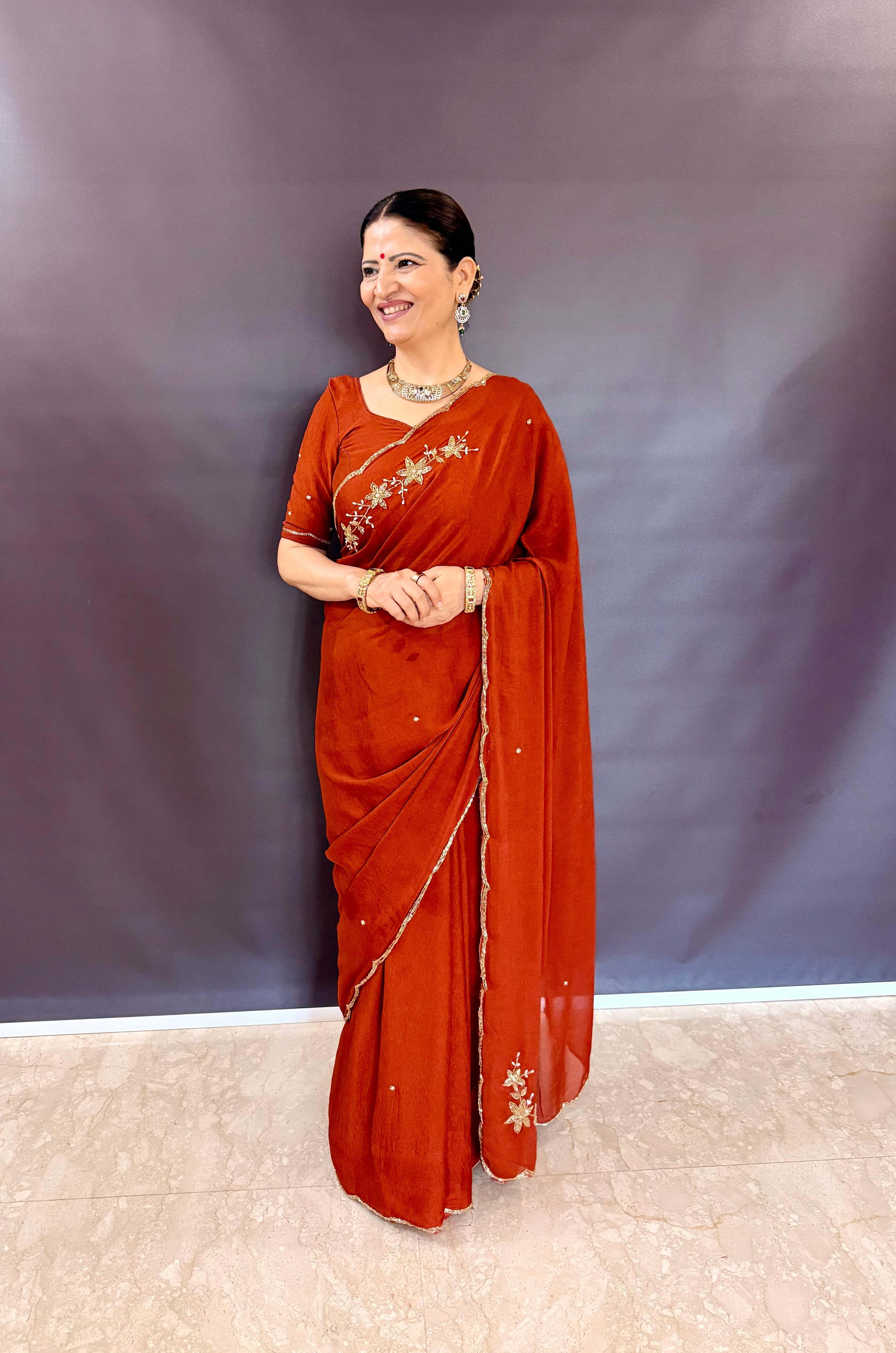 ORANGE RANGOLI CRUSHED SAREE WITH CUTDANA WORK