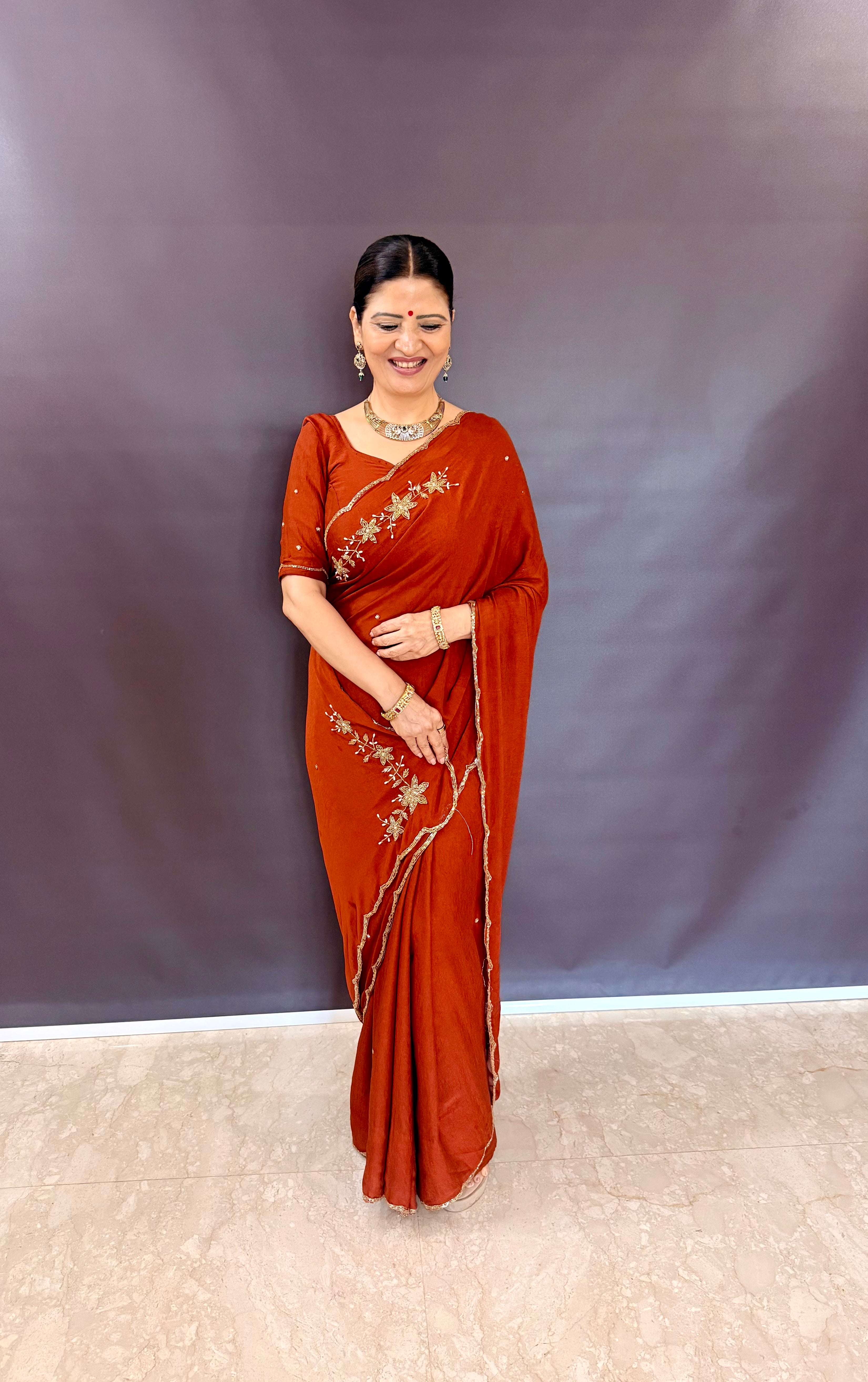 ORANGE RANGOLI CRUSHED SAREE WITH CUTDANA WORK