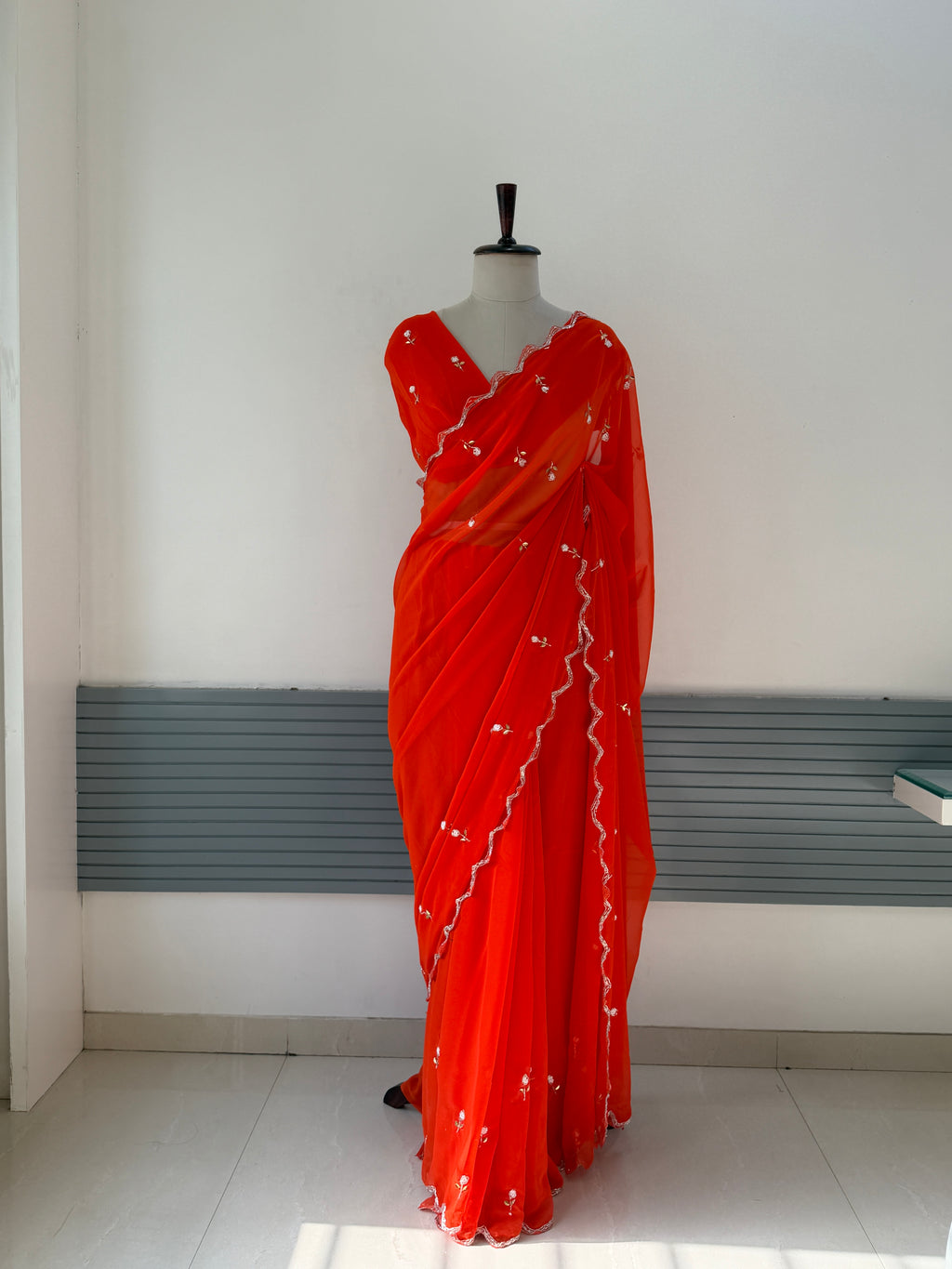 ORANGE GEORGETTE SAREE WITH CUTDANA AND BUTTI WORK