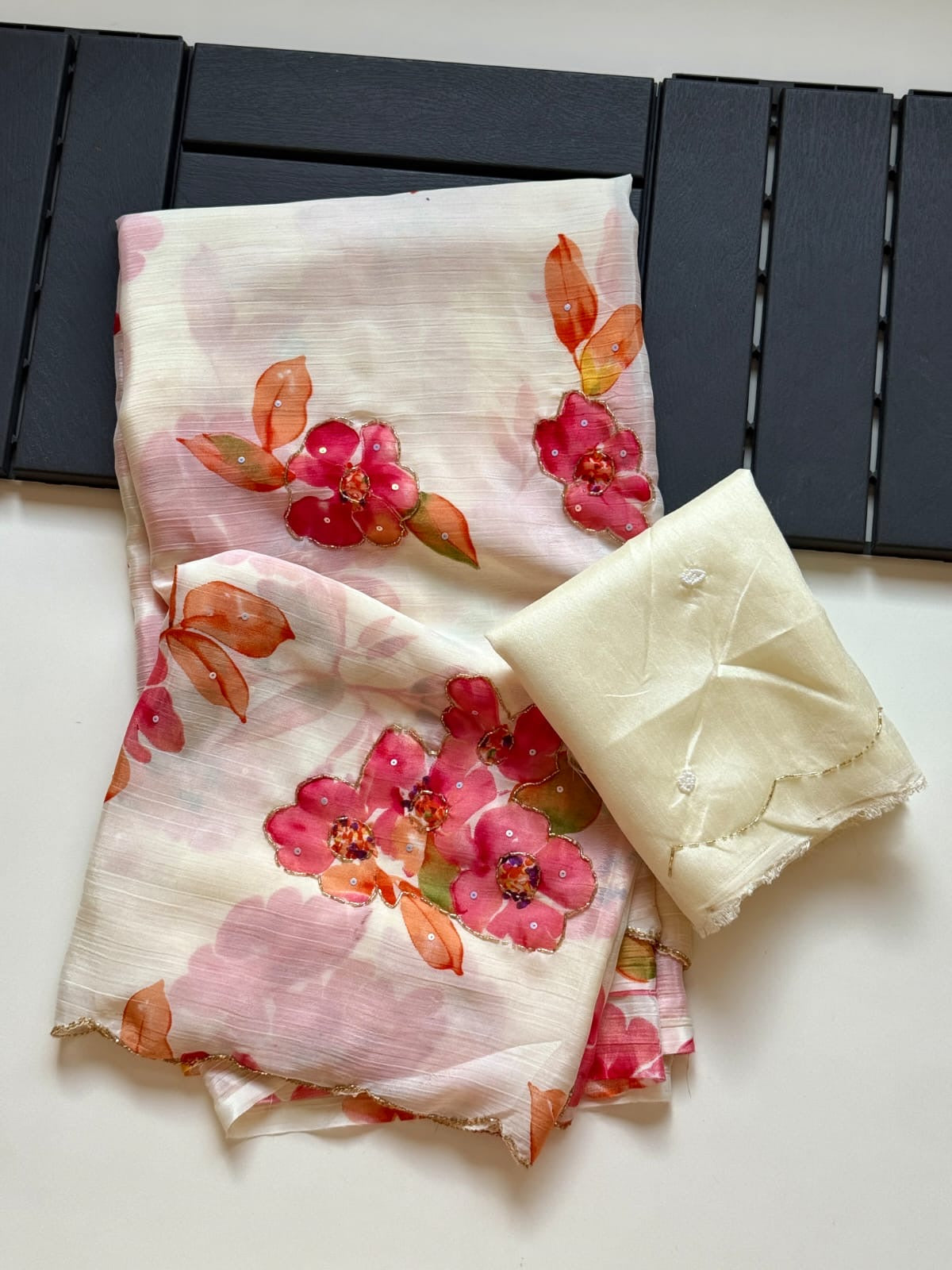 OFF WHITE SOFT CHINNON SAREE WITH FLOWER PRINT AND CUTDANA WORK