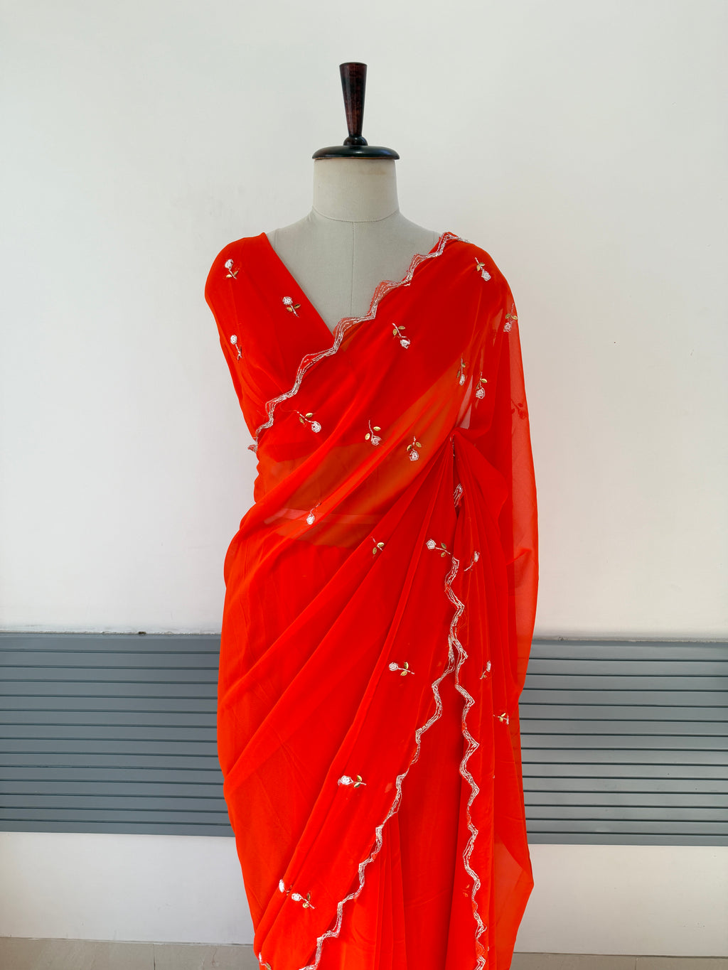 ORANGE GEORGETTE SAREE WITH CUTDANA AND BUTTI WORK
