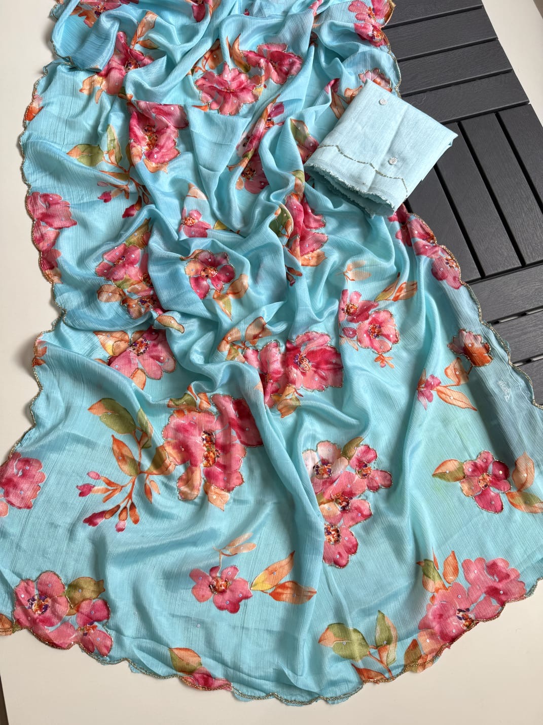 BLUE SOFT CHINNON SAREE WITH FLOWER PRINT AND CUTDANA WORK