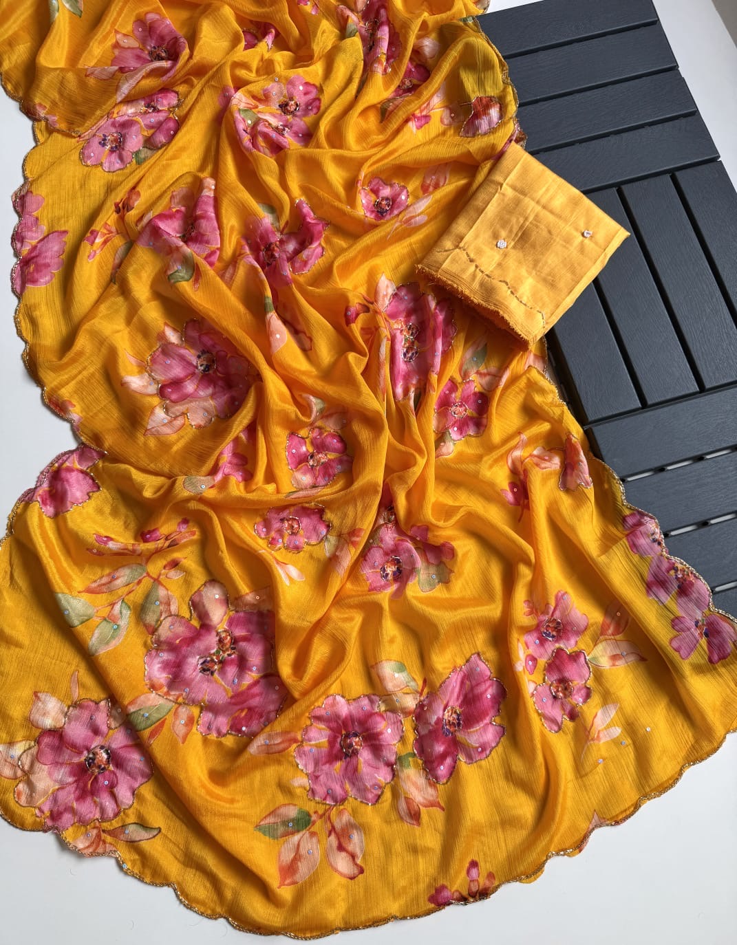 ORANGE SOFT CHINNON SAREE WITH FLOWER PRINT AND CUTDANA WORK