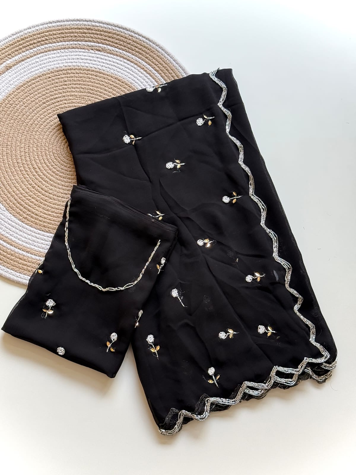BLACK GEORGETTE SAREE WITH CUTDANA AND BUTTI WORK