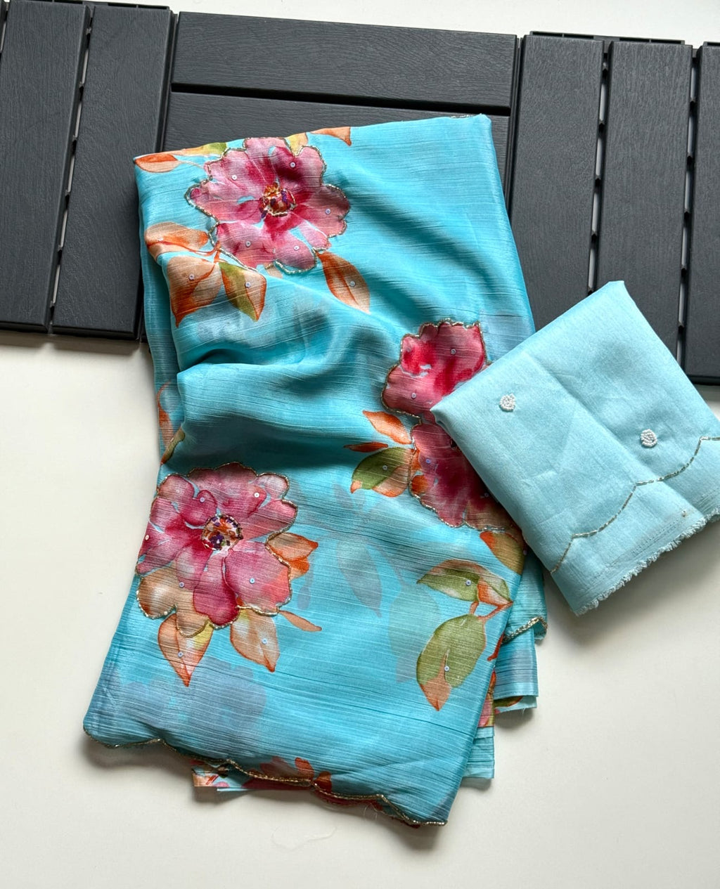BLUE SOFT CHINNON SAREE WITH FLOWER PRINT AND CUTDANA WORK