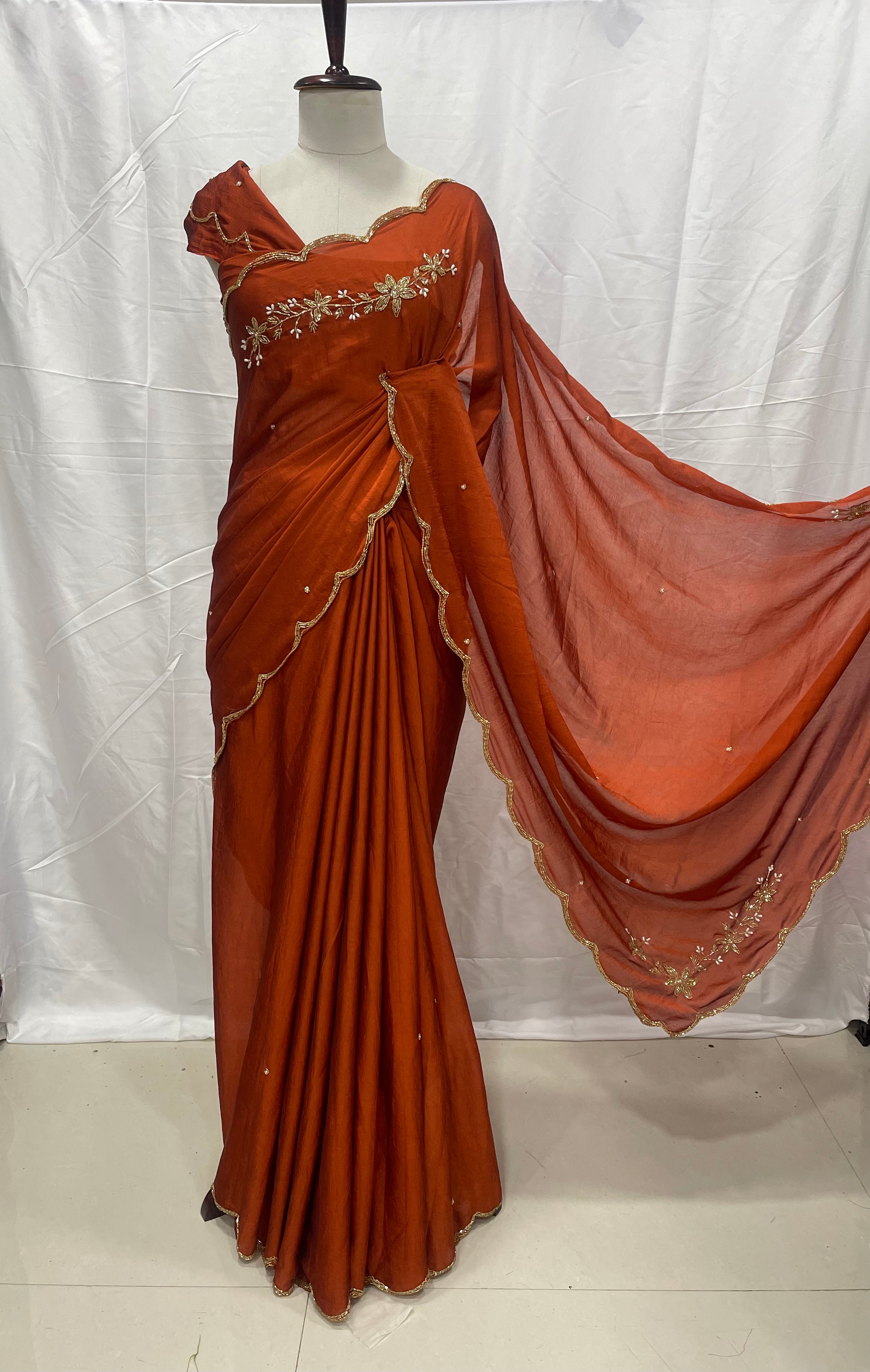 ORANGE RANGOLI CRUSHED SAREE WITH CUTDANA WORK