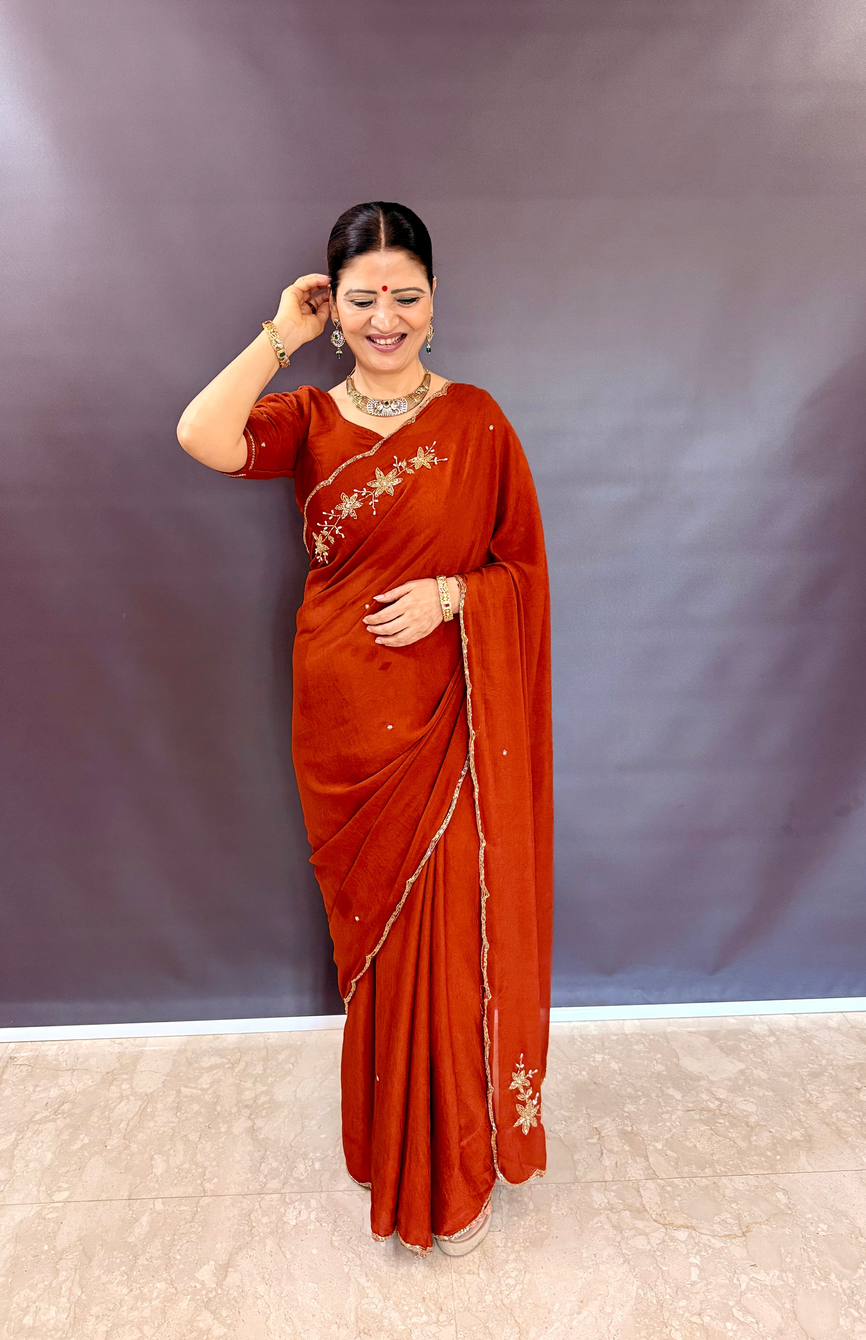 ORANGE RANGOLI CRUSHED SAREE WITH CUTDANA WORK