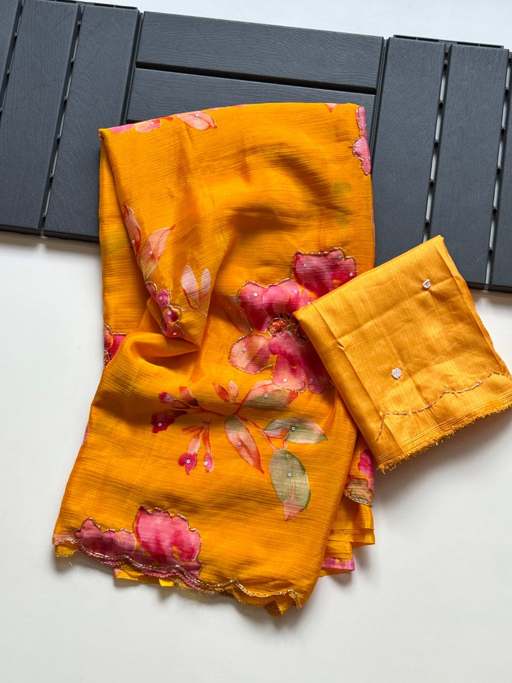 ORANGE SOFT CHINNON SAREE WITH FLOWER PRINT AND CUTDANA WORK