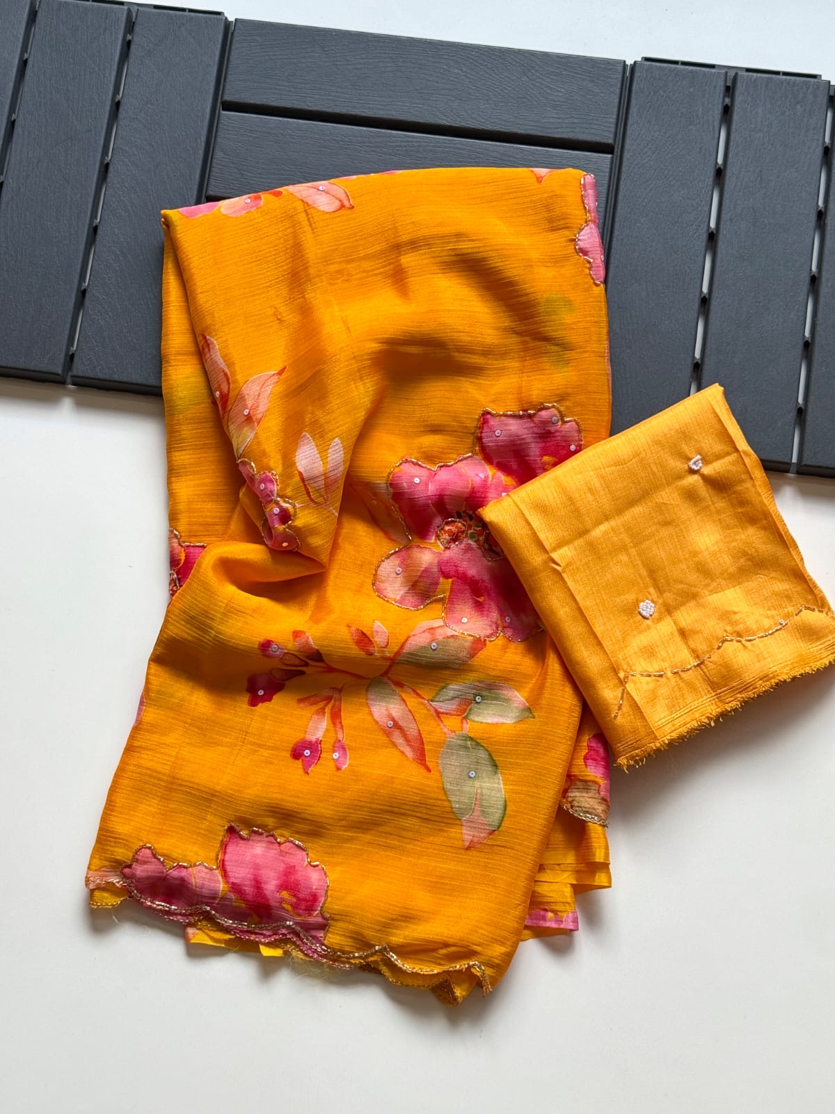 ORANGE SOFT CHINNON SAREE WITH FLOWER PRINT AND CUTDANA WORK