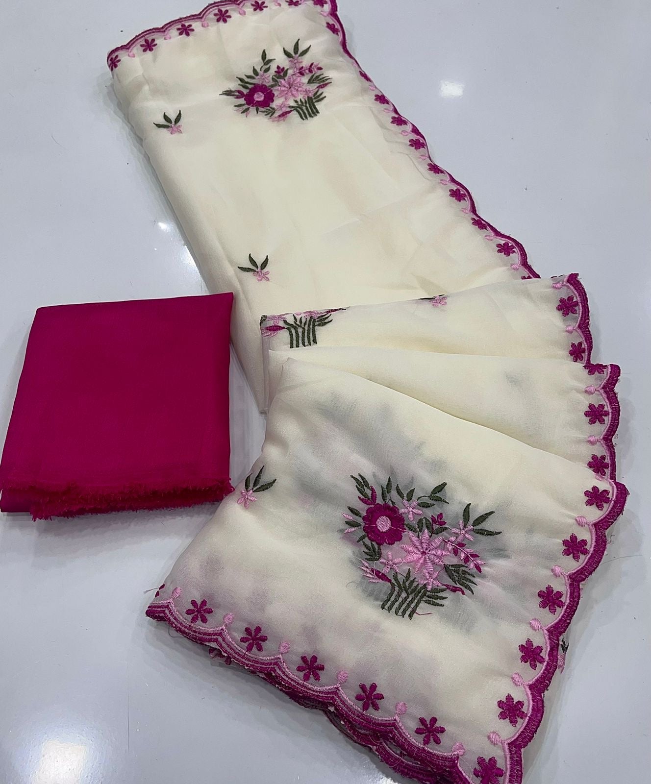 OFF-WHITE STAR GEORGETTE MULTI EMBROIDERED WOEK SAREE WITH CONTRAST BLOUSE