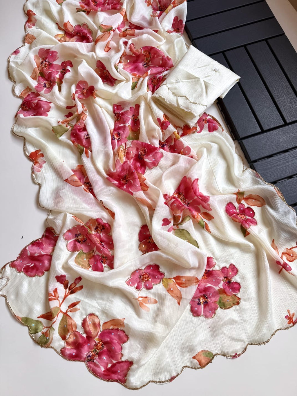 OFF WHITE SOFT CHINNON SAREE WITH FLOWER PRINT AND CUTDANA WORK