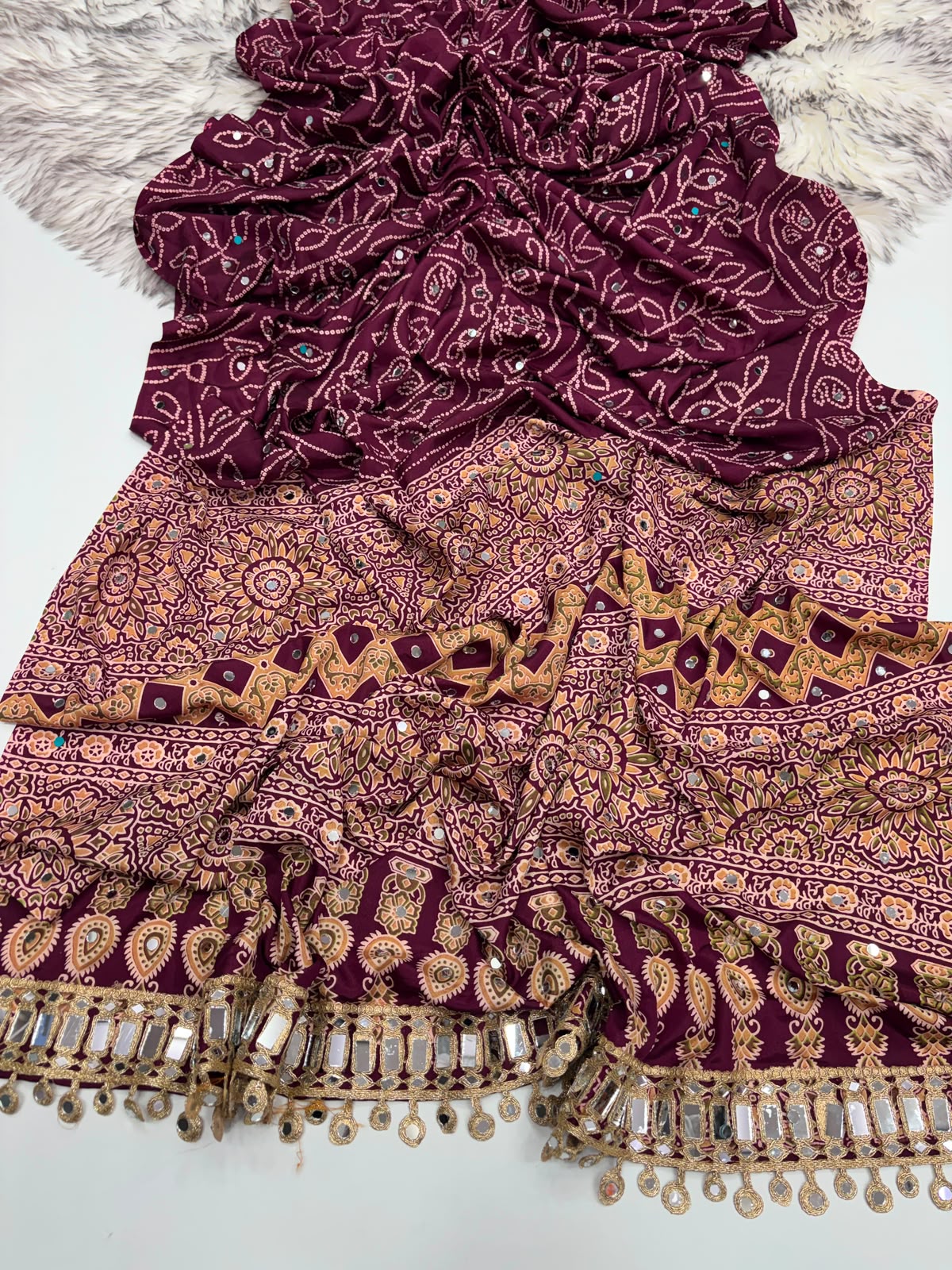 WINE AJRAKH SILK SAREE WITH  MIRROR WORK ALL OVER SAREE WITH DESGINER MIRROR LACE AT PALLU