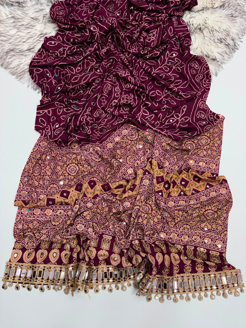 WINE AJRAKH SILK SAREE WITH  MIRROR WORK ALL OVER SAREE WITH DESGINER MIRROR LACE AT PALLU