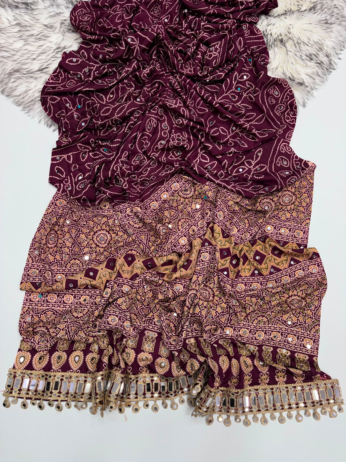 WINE AJRAKH SILK SAREE WITH  MIRROR WORK ALL OVER SAREE WITH DESGINER MIRROR LACE AT PALLU