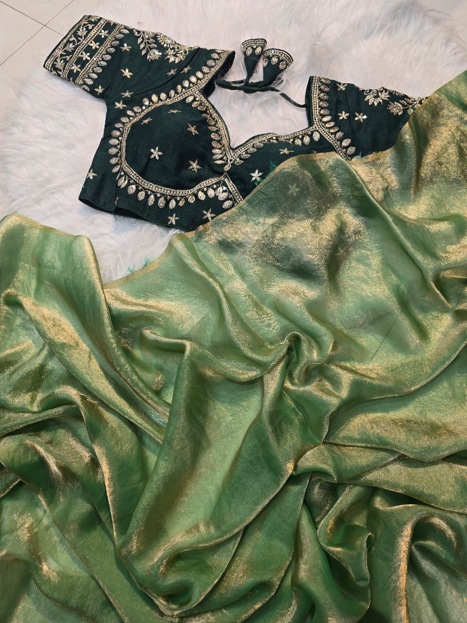 BOTTLE GREEN SPACE SILK SAREE WITH DESGINER SITCHED BLOUSE