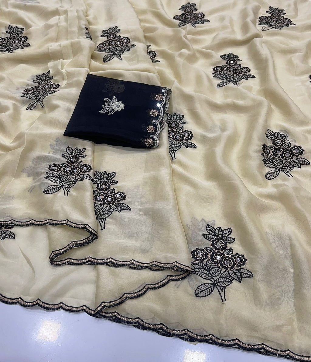 Off - White Rangoli silk saree with embroidery work