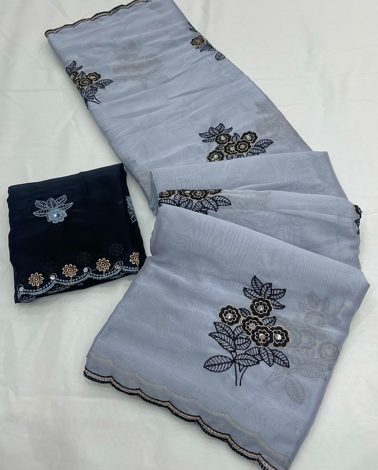 Light Grey Rangoli silk saree with embroidery work