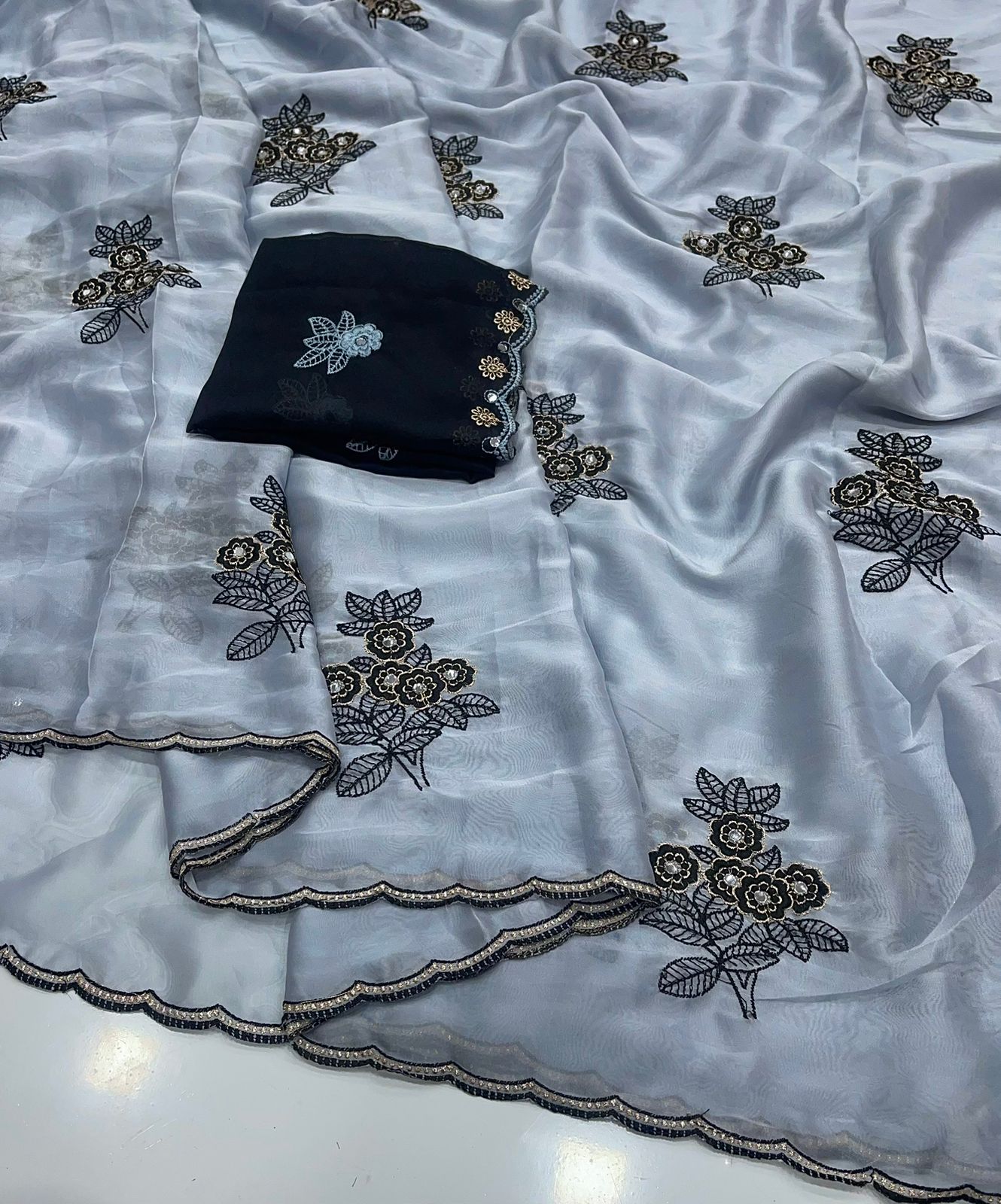 Light Grey Rangoli silk saree with embroidery work